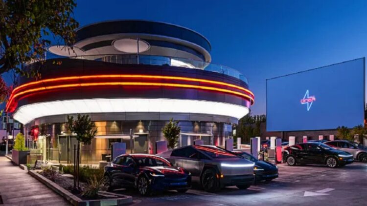 It's official - Tesla opens its first futuristic restaurant with drive-in movie theater, retro burgers and popcorn-serving robots