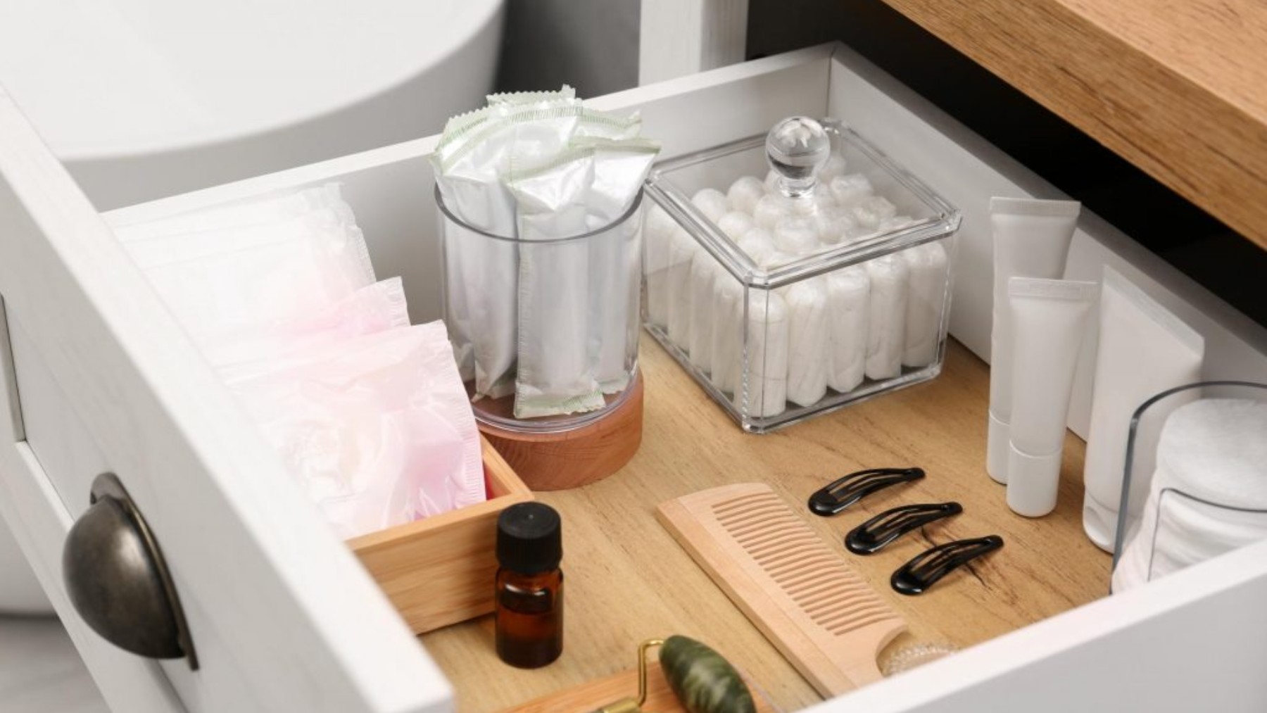 Say goodbye to bathroom clutter—this trick using candle holders and mirrors from Dollar Tree creates an elegant, inexpensive, three-tiered shelf that's perfect for keeping everything tidy